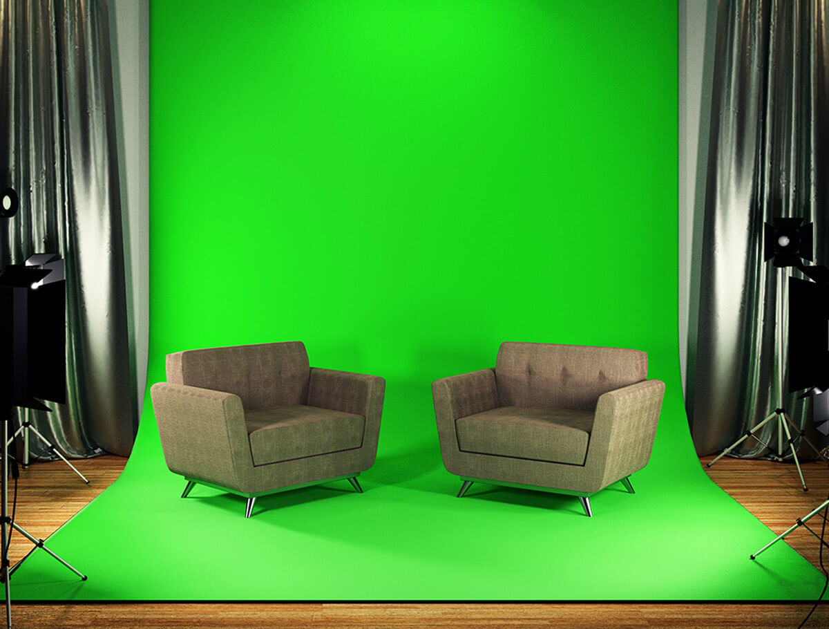 2 couches in front of a green screen